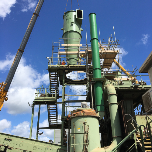 Stage 4 - Lifting new cylone into care shreader